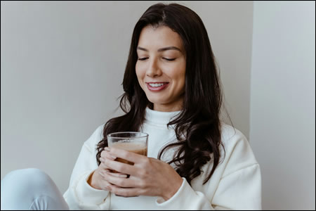 Woman drinking protein shake